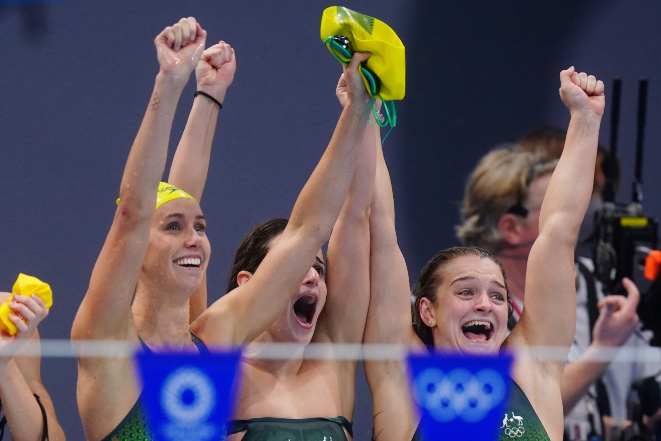 Australia’s 4x100m Medley Relay team of Kaylee McKeown, Chelsea Hodges, Emma McKeon and Cate Campbell celebrate their Gold medal win at the Tokyo Aquatics Centre . (AAP Image/Adam Davy) 