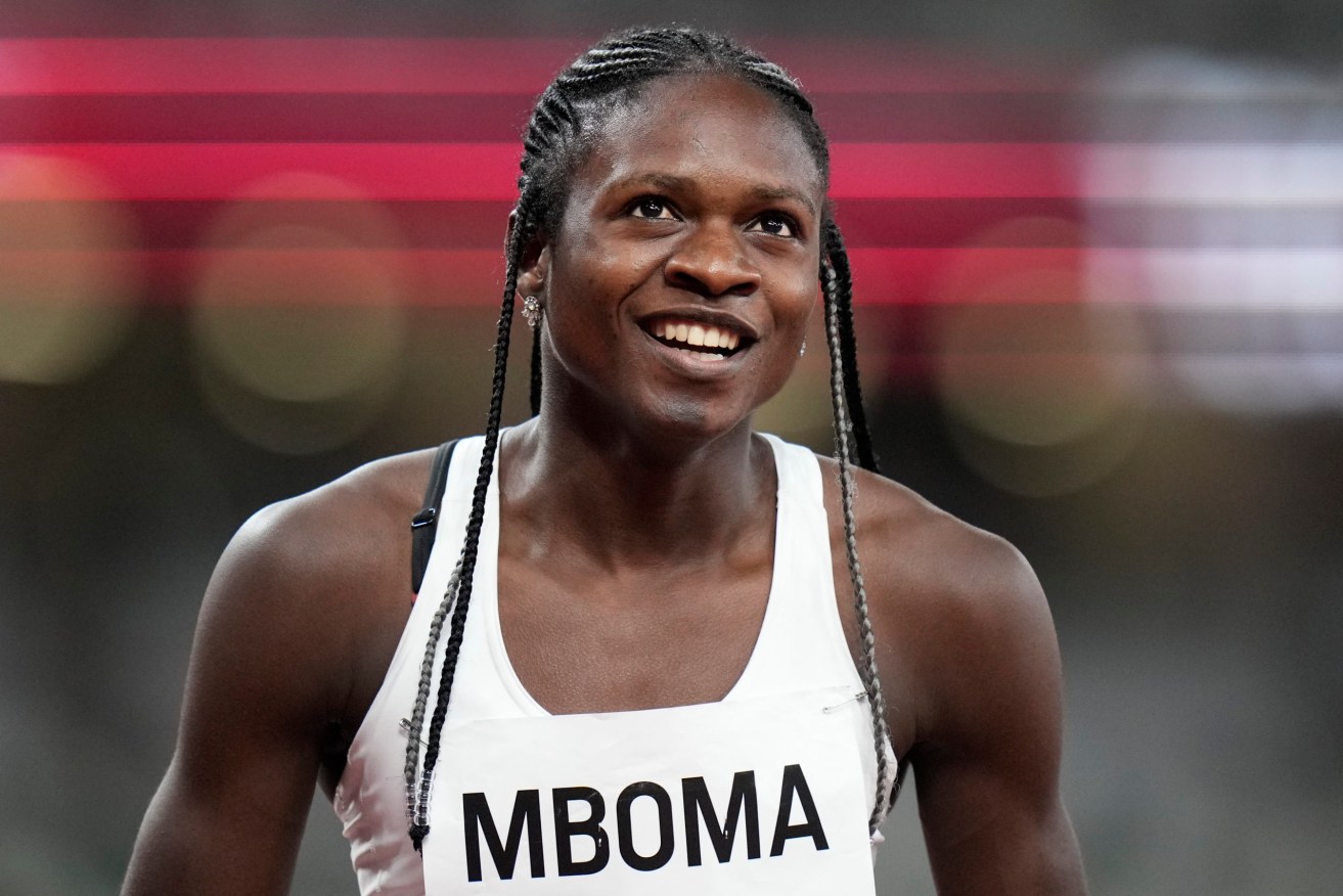 Christine Mboma, of Namibia, reacts after a semifinal of the women's 200-meters at the 2020 Summer Olympics, Monday, Aug. 2, 2021, in Tokyo. (AP Photo/Petr David Josek)