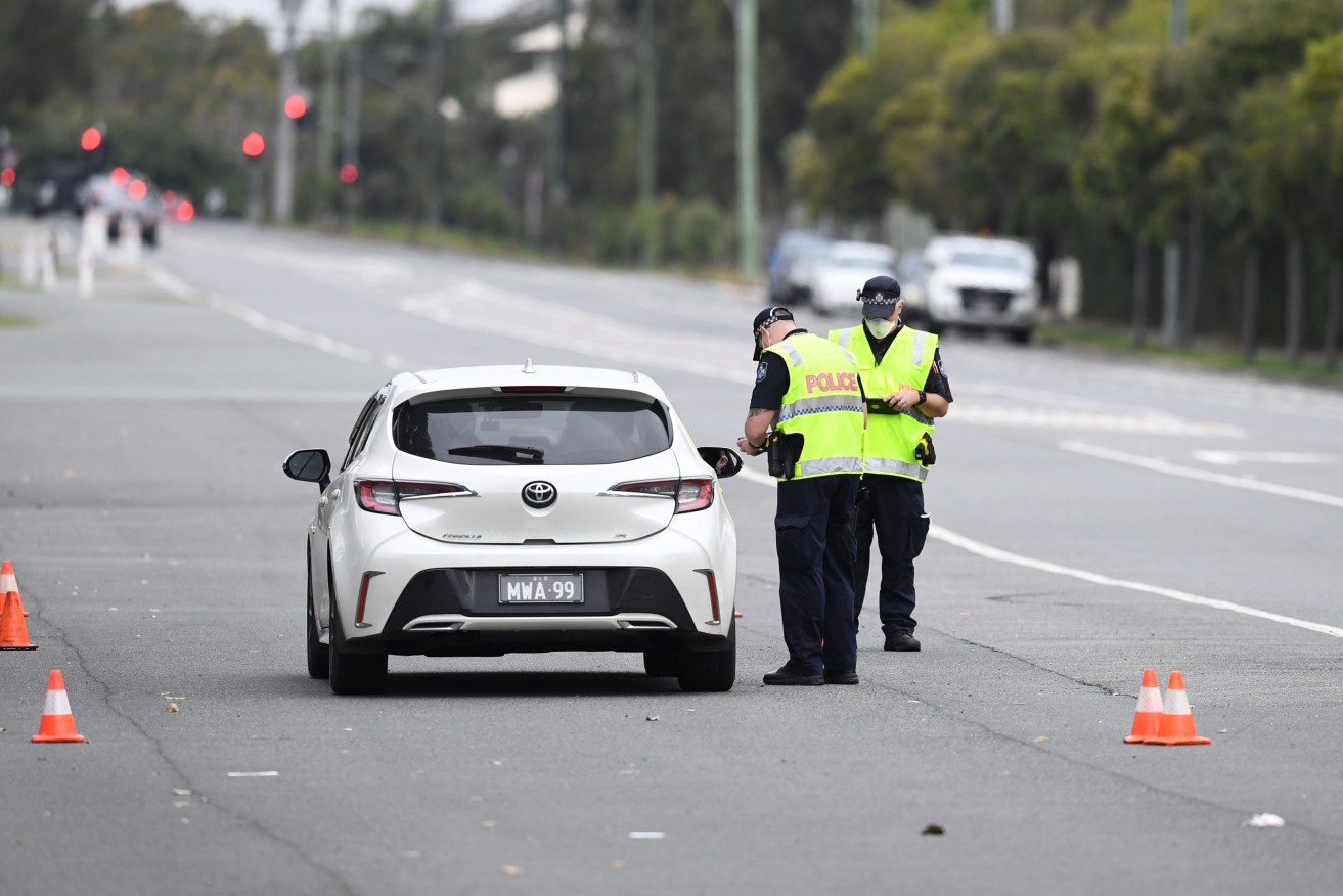 Police allege they found $4 million in cash in the boot of a car that was pulled over by Queensland police in a random stop. (File photo). (AAP Image/Dan Peled) 