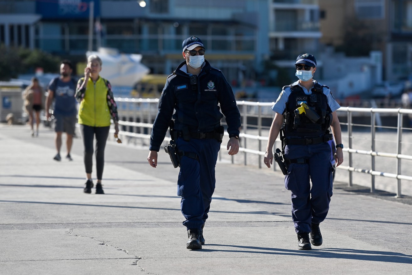 NSW Police officers patrol Bondi Beach in Sydney. (AAP Image/Bianca De Marchi)