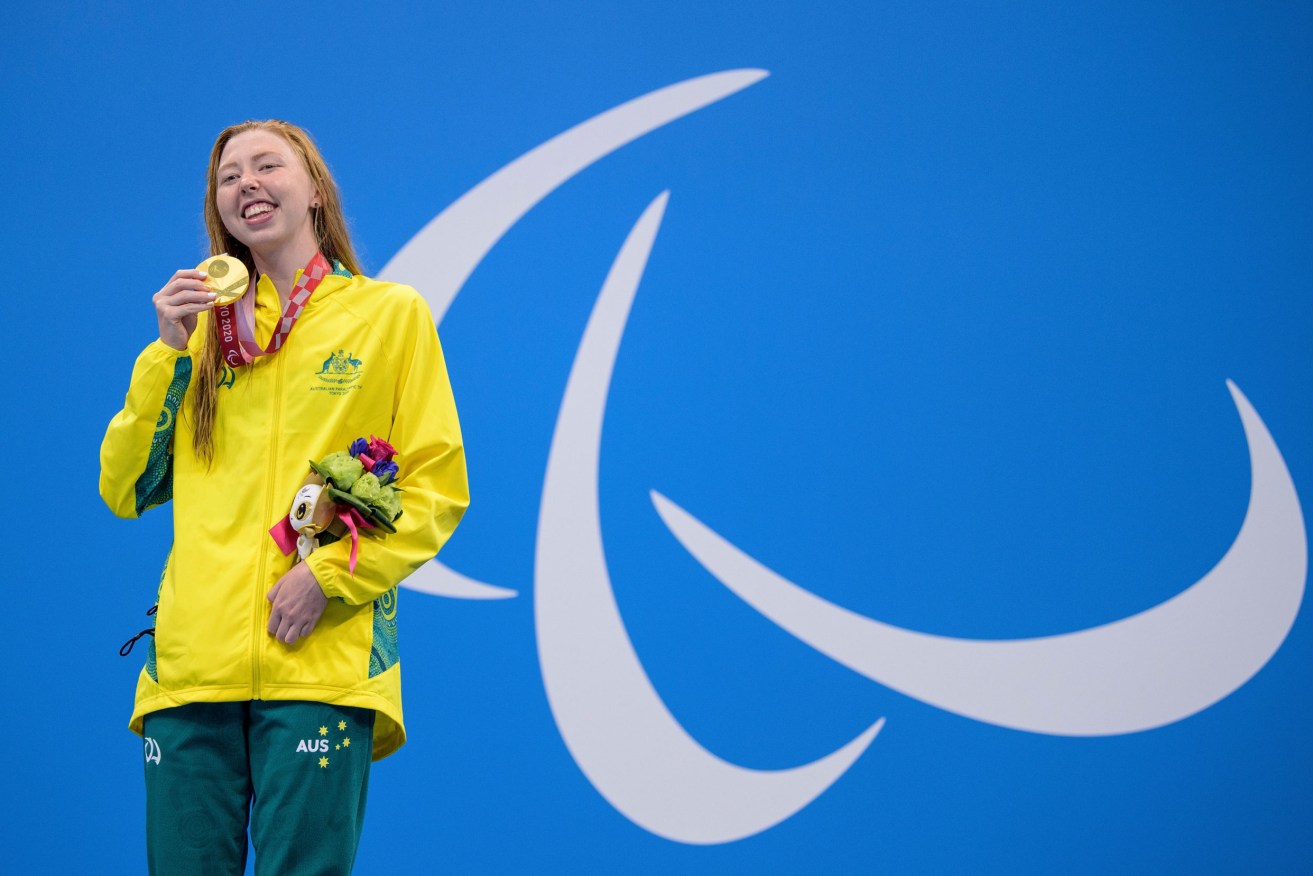Gold Medallist Lakeisha Patterson of Australia receives her Gold medal for the Women's 400m Freestyle S9 in the Tokyo Aquatics Centre, (AAP Image/OIS/ Joel Marklund) 