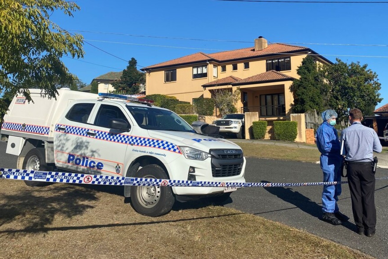 Police outside the Coorparoo home of former Wallaby great Toutai Kefu, whose home was allegedly invaded and his family attacked with knifes and machetes. (Photo: ABC)