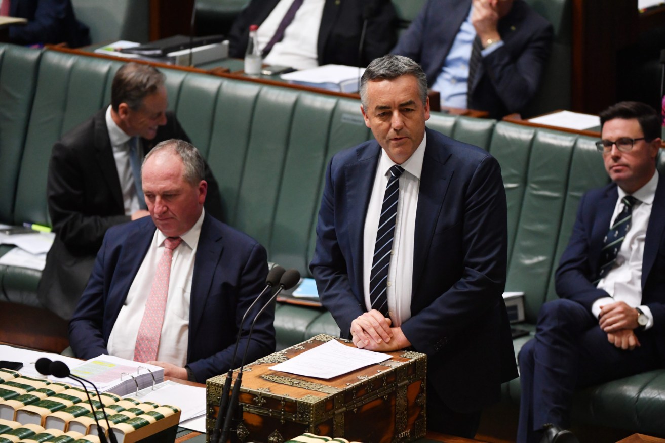Deputy Prime Minister Barnaby Joyce and former Veterans’ Affairs minister Darren Chester during Question Time in the House of Representatives. (AAP Image/Mick Tsikas) 