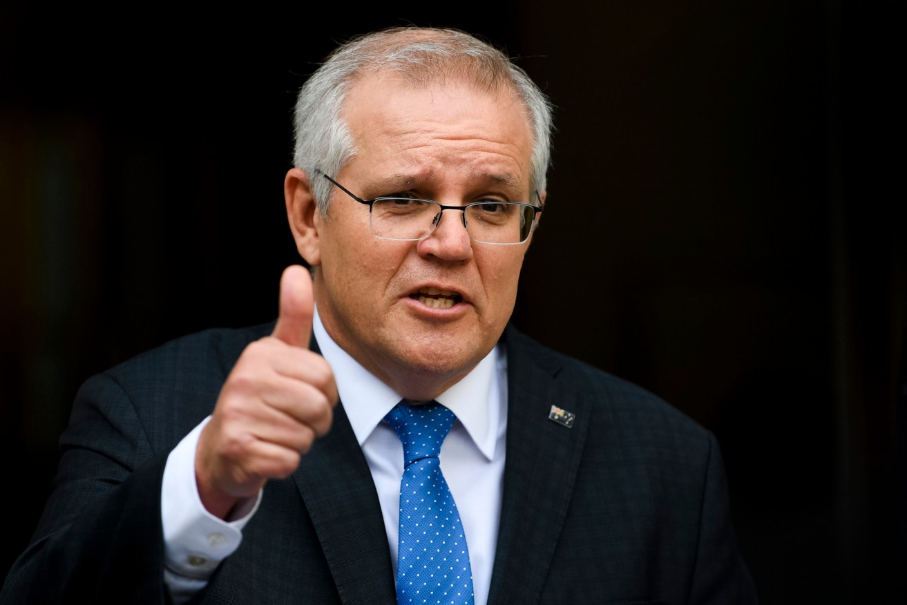 Australian Prime Minister Scott Morrison introduce the tax offset (AAP Image/Lukas Coch) 