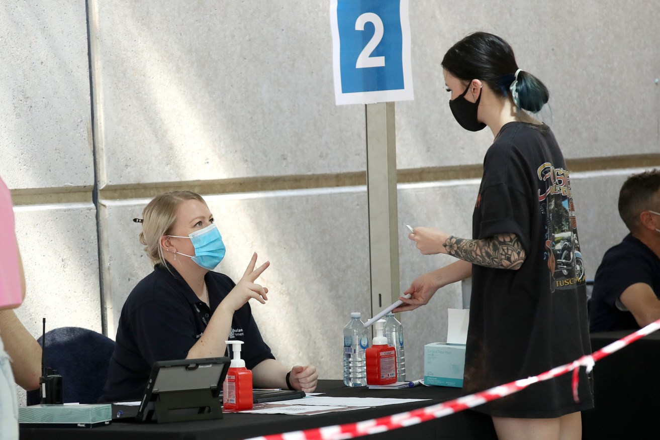 The mass vaccination hub at the Brisbane Convention and Exhibition Centre. (AAP Image/Jono Searle) 
