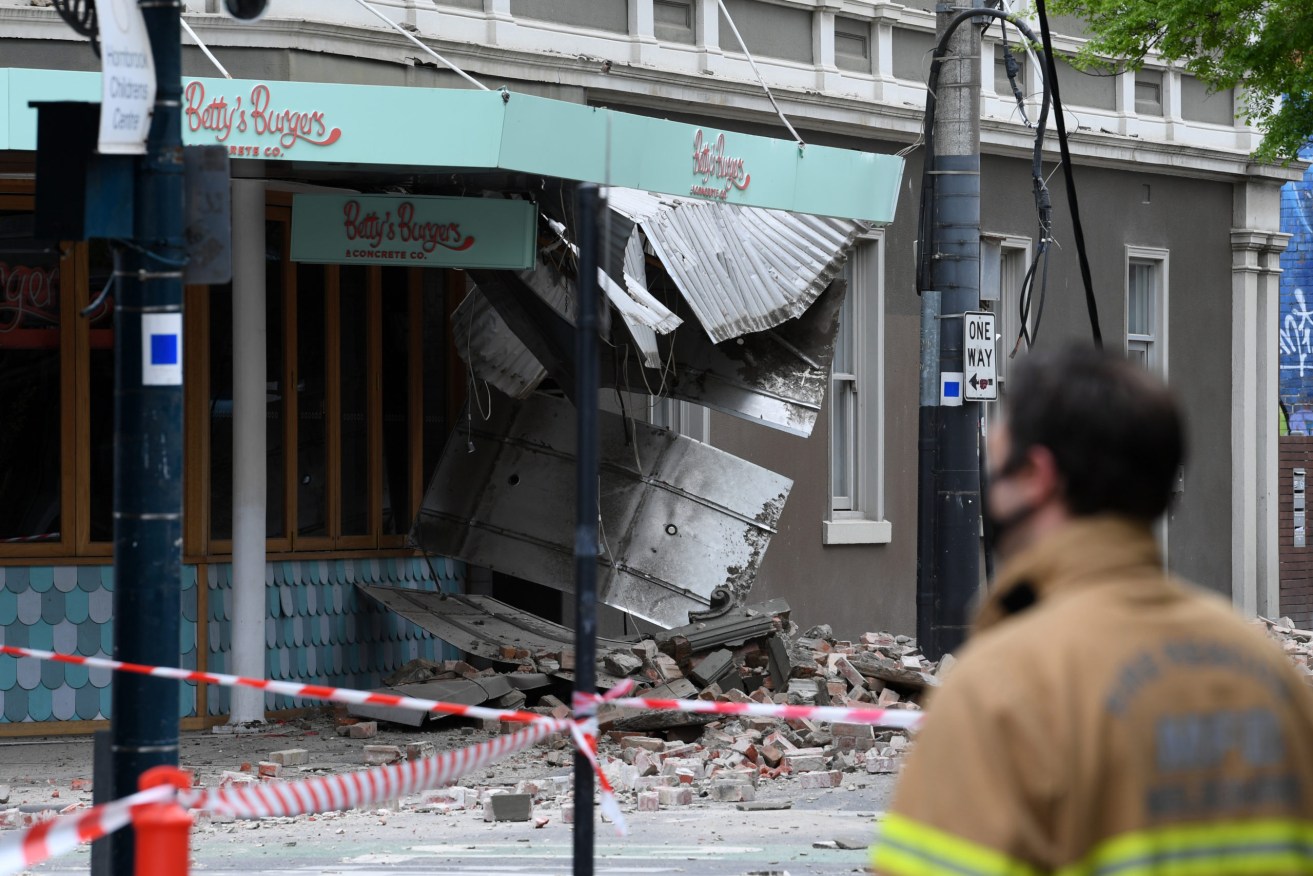 Damage to the exterior of Betty’s Burgers on Chapel Street in Melbourne following an earthquake. (AAP Image/James Ross)