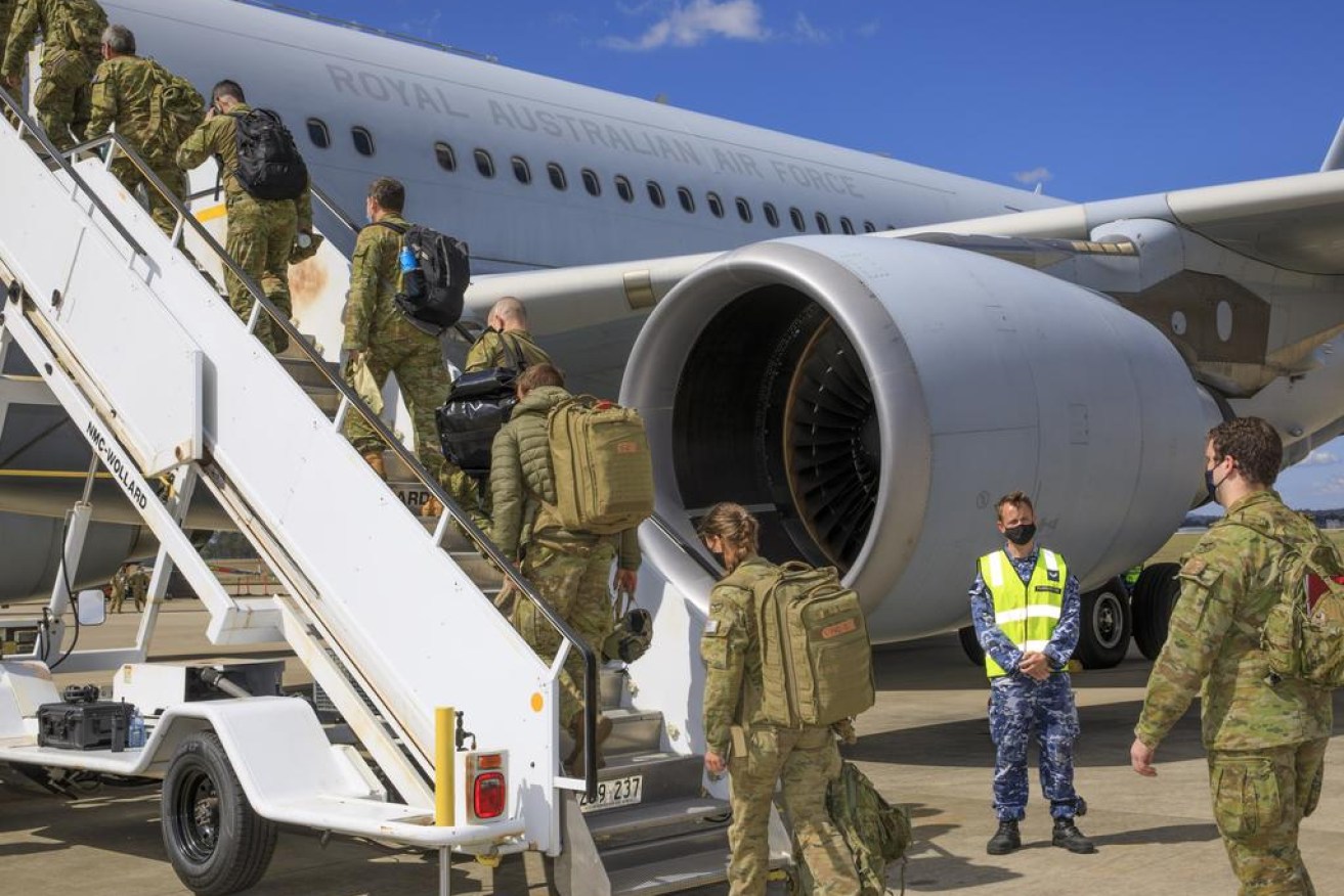 A contingent of Air Force and Army personnel board a waiting KC-30A Multi-Role Tanker Transport aircraft at RAAF Base Amberley bound for the Middle East to support evacuation efforts in Afghanistan. Picture: ADF CPL Brett Sherriff