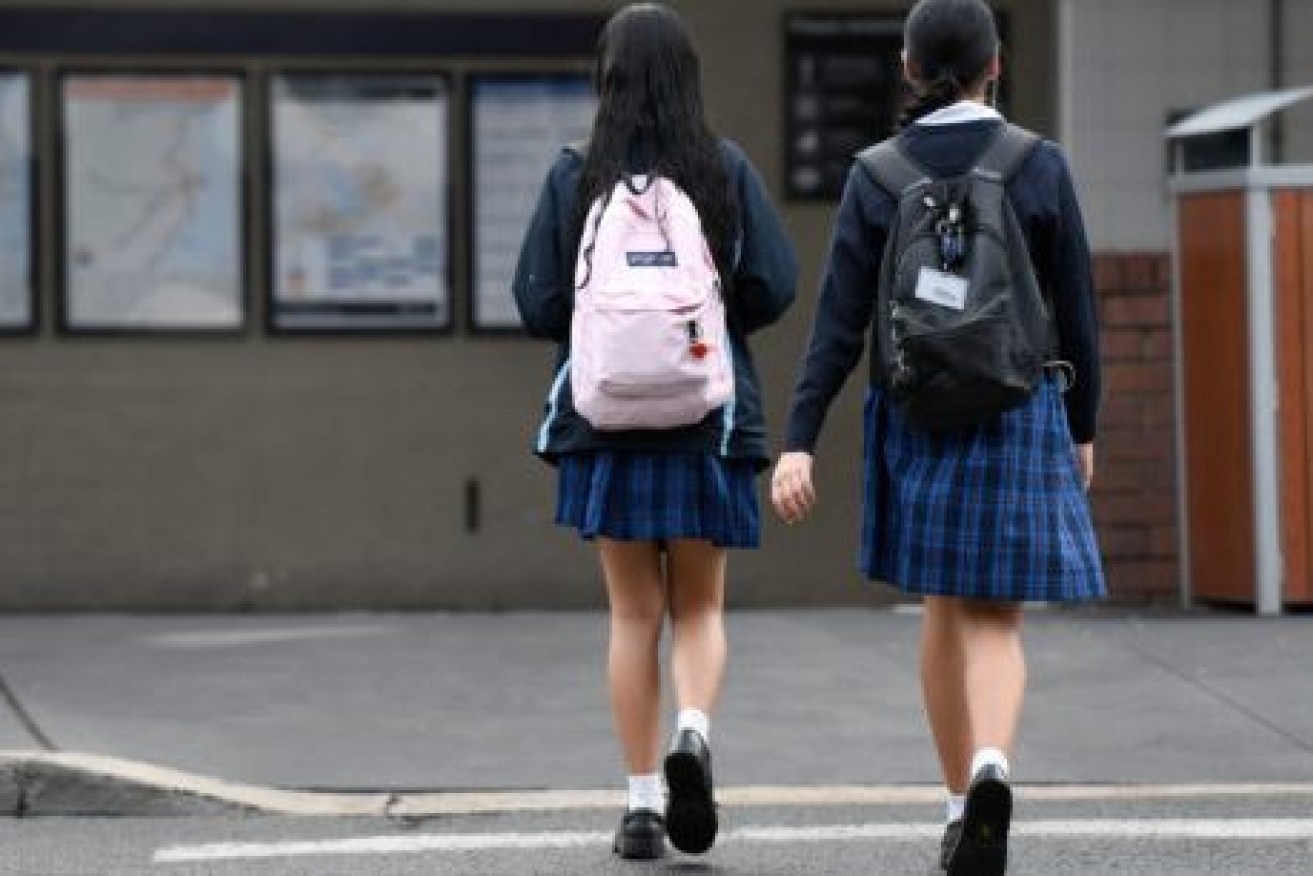 A Victorian private boys' school has expelled students involved in a game where female students are 'rated' by male students. (AAP Image/Bianca De Marchi) 