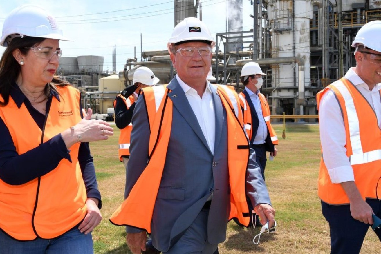 Queensland Premier Annastacia Palaszczuk (left), Andrew 'Twiggy' Forrest (centre) from Fortescue Future Industries and Deputy Premier Steven Miles (right) are seen during a hydrogen announcement at Incitec Pivot on Gibson Island . (AAP Image/Darren England) 