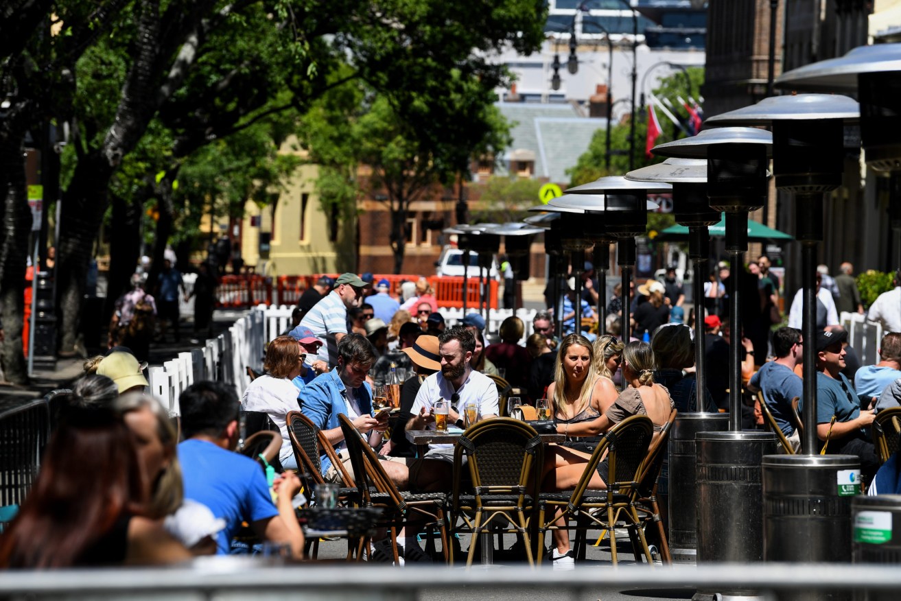 An extended outdoor dinning area of the The Mercantile Hotel, at The Rocks. Despite a spike in virus cases, NSW is clearing the way for a further easing of restrictions. (AAP Image/Bianca De Marchi) 