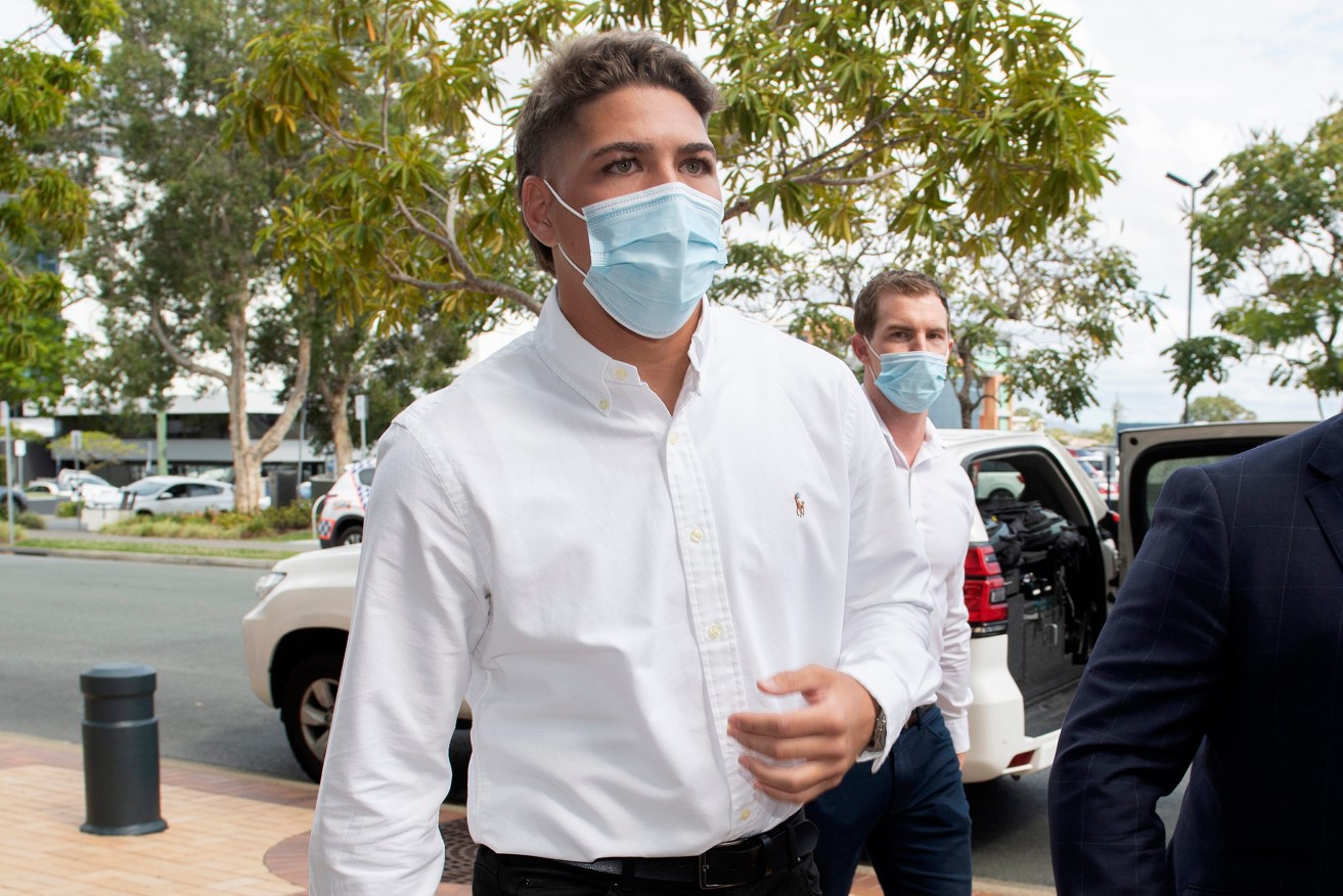 Reece Walsh (left) arrives at the Southport Magistrates Court on the Gold Coast,  charged with possession of cocaine after he was arrested in Surfers Paradise on September 26. (AAP Image/Dave Hunt) 