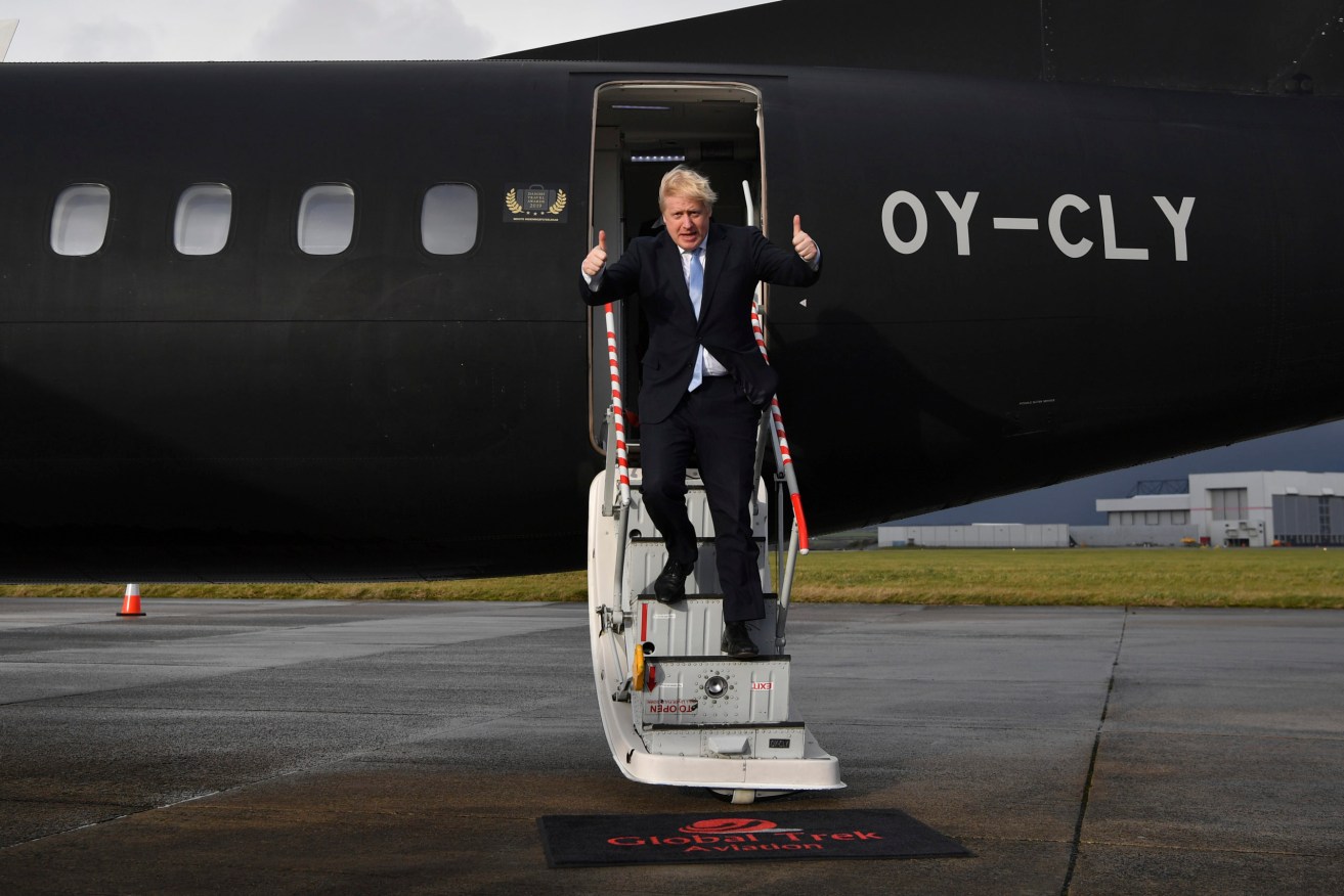 Britain's Prime Minister Boris Johnson has been accused of hypocrisy for leaving the COP26 climate summit in a private jet. (File image: Ben Stansall/ Pool Photo via AP)