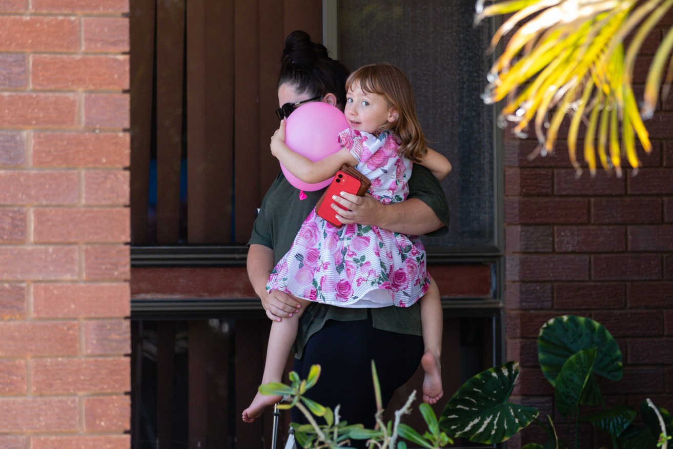 Cleo Smith and her mum Ellie Smith are seen leaving a house where she spent her first night after being rescued in Carnarvon, two weeks after she disappeared from her family's tent at a remote West Australian campsite. (AAP Image/Richard Wainwright) 