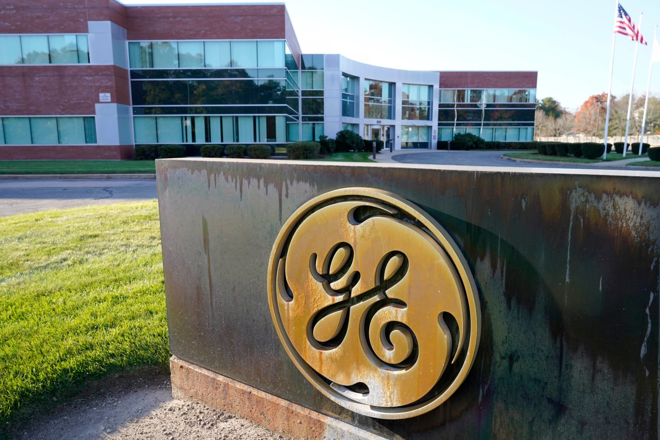 General Electric, the storied American manufacturer that struggled under its own weight after growing to become a sprawling conglomerate, will divide itself into three public companies focused on aviation, health care and energy. (AP Photo/Steven Senne)