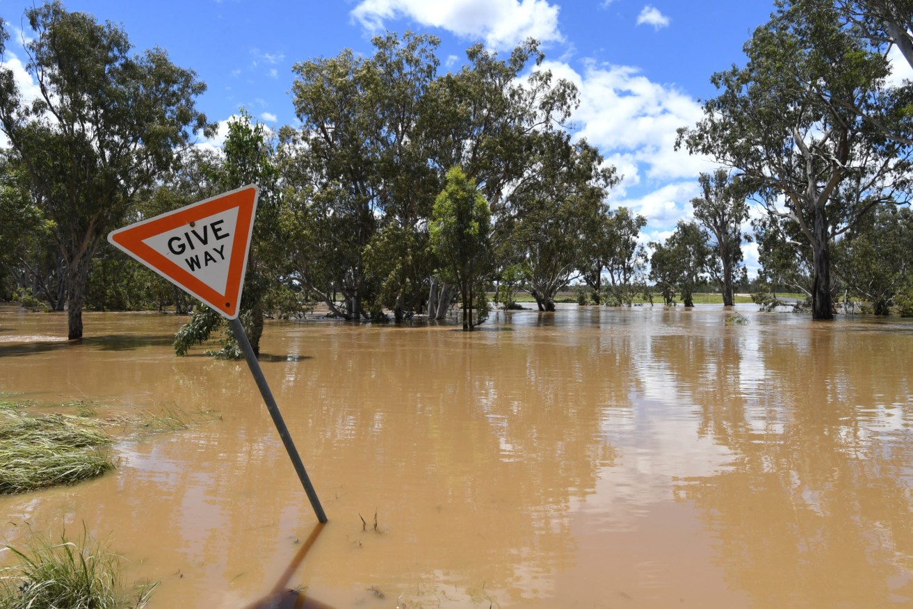 Floodwaters cover a road near the town of Inglewood earlier this week. (AAP Image/Darren England) 
