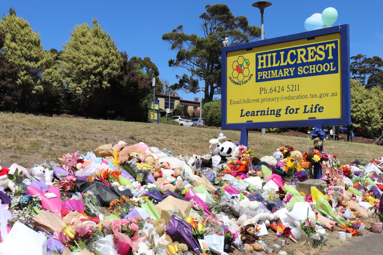 Flowers and tributes outside Hillcrest Primary School in Devonport, Tasmania. (AAP Image/Ethan James) 