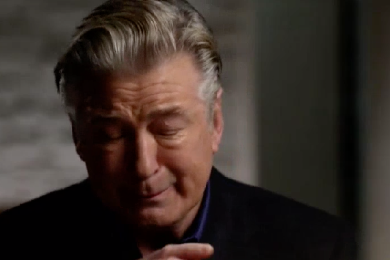 Alex Baldwin has given a tearful interview, speaking for the first time about the fatal movie set shooting. (Image: ABC News (US)).
