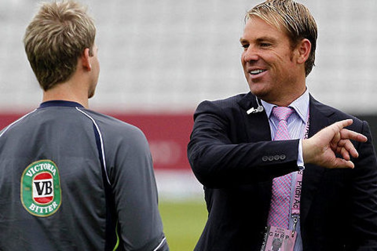 Shane Warne shares some advice with a young Steve Smith (left). (File image).