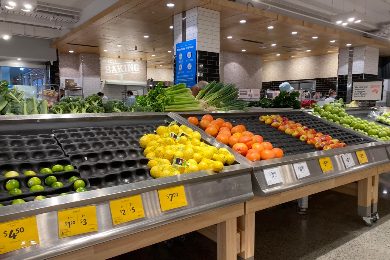 Empty shelves of fruit and vegetables are seen at a supermarket in Sydney, Friday, January 7, 2022.  (AAP Image/Mick Tsikas) 