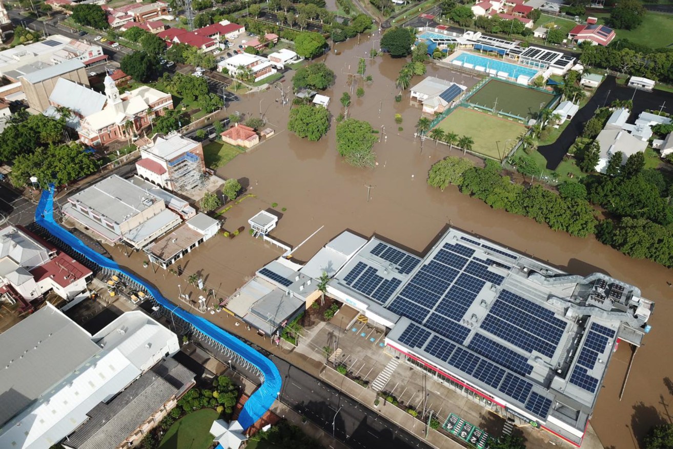 A supplied image obtained on Sunday, January 9, 2022, shows an aerial view of floodwaters impacting the CBD of Maryborough, north of Brisbane, in the wake of former tropical cyclone Seth. (AAP Image/Supplied by Jade Wellings) 