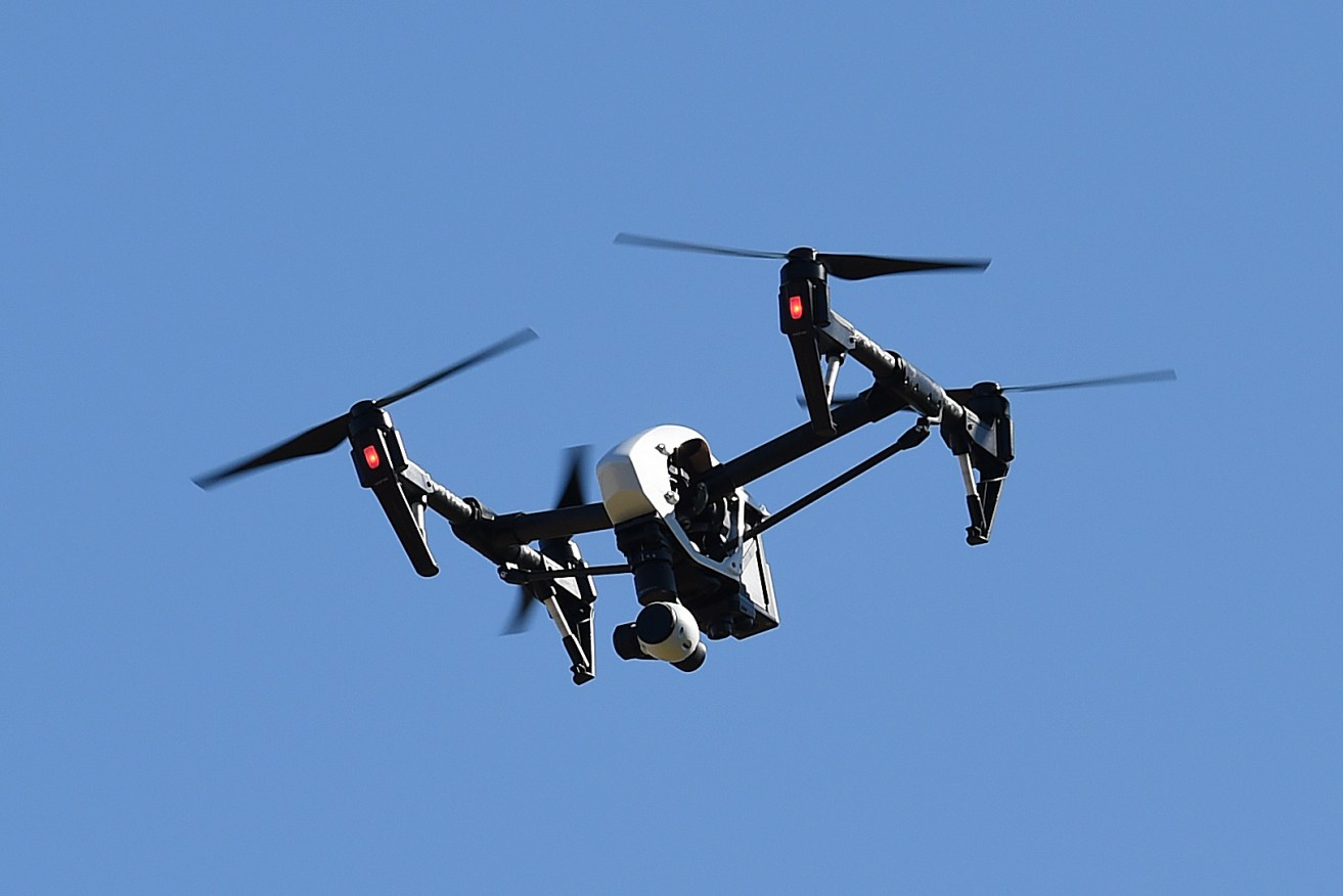 Drones may soon have their wings clipped as part of new laws proposed by the Queensland Government. (AAP Image/Dan Peled) 