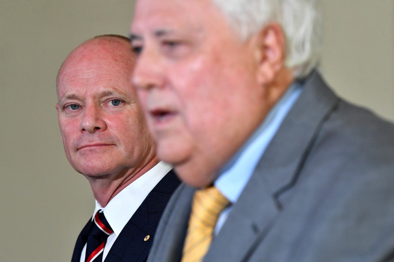 Liberal Democrats Senate candidate Campbell Newman (left) and United Australia Party Leader Clive Palmer (right) speak to the media during a press conference in Brisbane November. The parties will exchange preferences at the next Federal Election. (AAP Image/Darren England)
