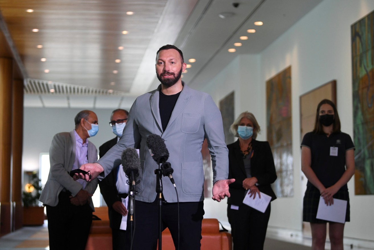 Olympic Champion and now gay rights campaigner Ian Thorpe speaks to the media during a press conference at Parliament House in Canberra, Tuesday. (AAP Image/Lukas Coch) 