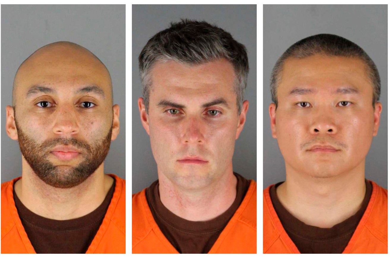 Former Minneapolis police officers J. Alexander Kueng, Thomas Lane and Tou Thao were convicted of violating George Floyd’s civil rights when Officer Derek Chauvin pressed his knee into Floyd’s neck for 9 1/2 minutes as the 46-year-old Black man was handcuffed and facedown on the street on May 25, 2020. (Hennepin County Sheriff's Office via AP, File)