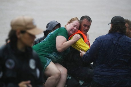 Deluge sweeps south to Gold Coast as flash flooding sparks more rescues