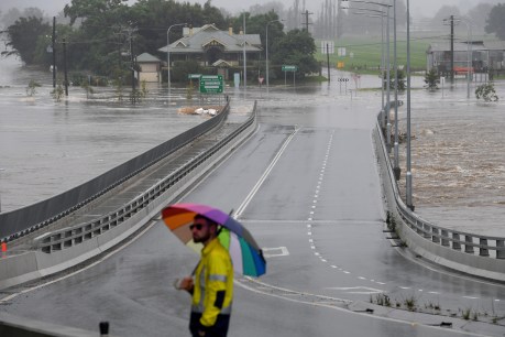 Five dead, half a million on standby to leave homes as relentless rain bomb hits Sydney