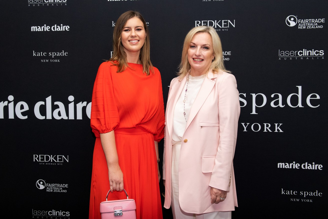 Activist and author Brittany Higgins (left) and CEO and workplace safety advocate Christine Holgate pose for a photograph during the Marie Claire International Women’s Day breakfast in Sydney. (AAP Image/Bianca De Marchi)