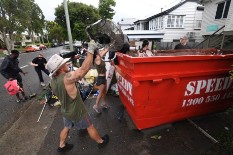 ‘Grubs’: Looters prey on flood victims as clean-up begins amid more warnings