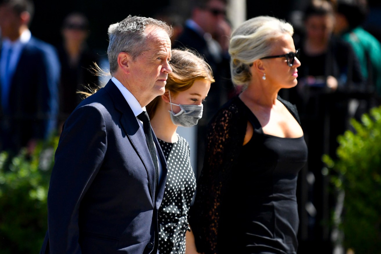 Former leader of the Opposition Bill Shorten, wife Chloe Shorten and daughter Clementine arrive ahead of the funeral service for Senator Kimberley Kitching at St Patrick's Cathedral in Melbourne, Monday (AAP Image/Joel Carrett) 