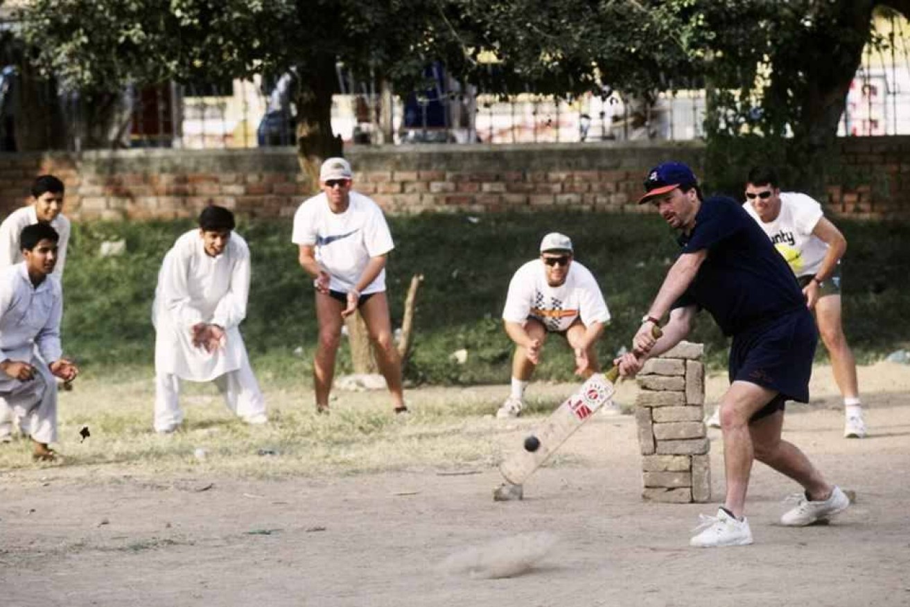 Steve Waugh plays street cricket with children in the streets of Pakistan during the 1994 tour. (Image: Facebook)