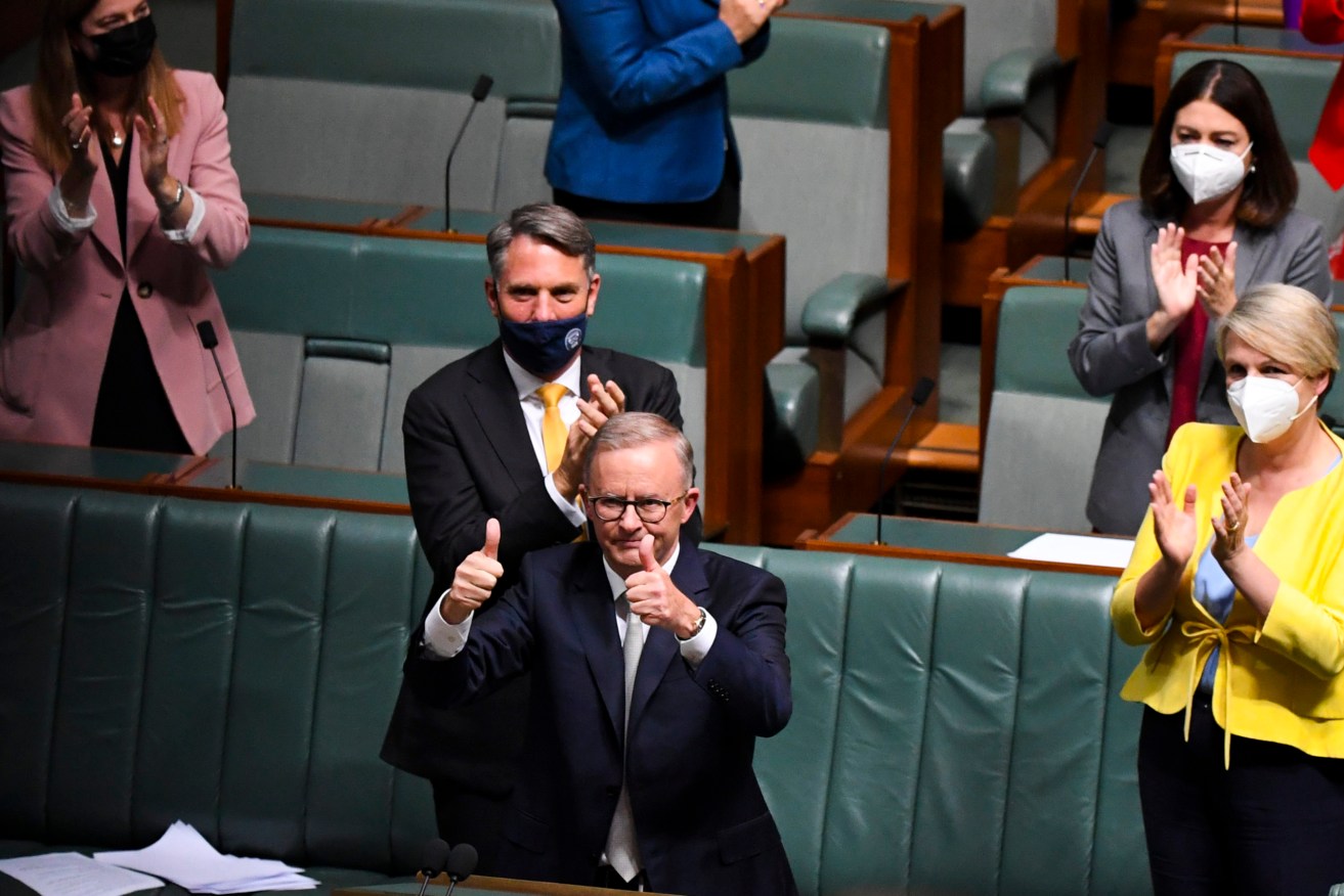 Federal Opposition Leader Anthony Albanese acknowledges the public galleries after delivering his Budget Reply Speech. (AAP Image/Lukas Coch) 