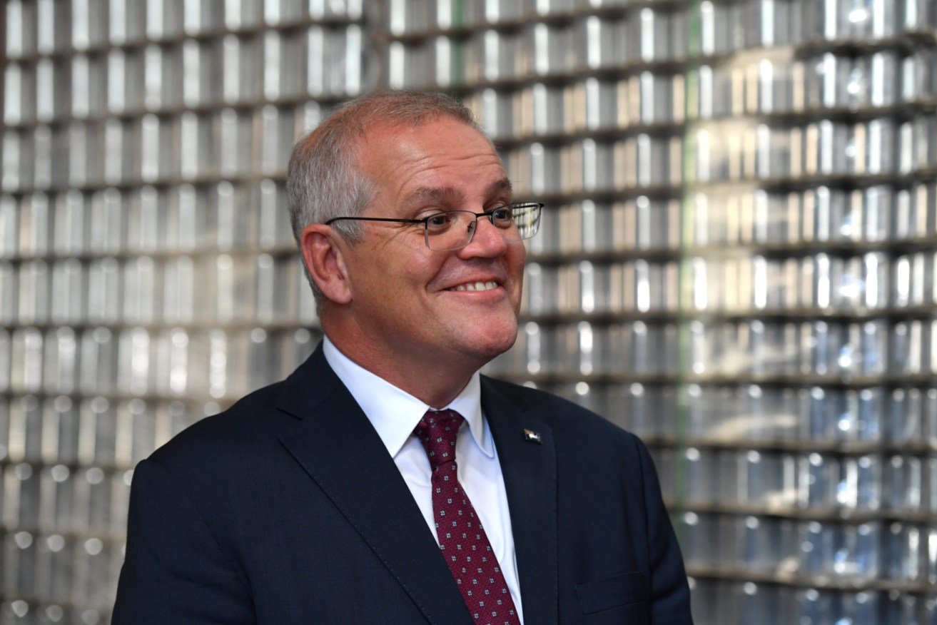 Former prime minister Scott Morrison campaigning at the last election. (AAP Image/Mick Tsikas) 