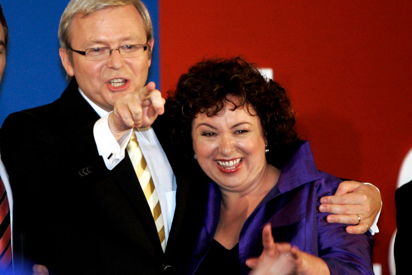Australia's new Prime Minister Kevin Rudd points to supporters as he and his wife Therese Rein celebrate during his acceptance speech following his victory in the 2007 federal election, in Brisbane, Australia, Saturday, Nov. 24, 2007.  (AP Photo/Rob Griffith)