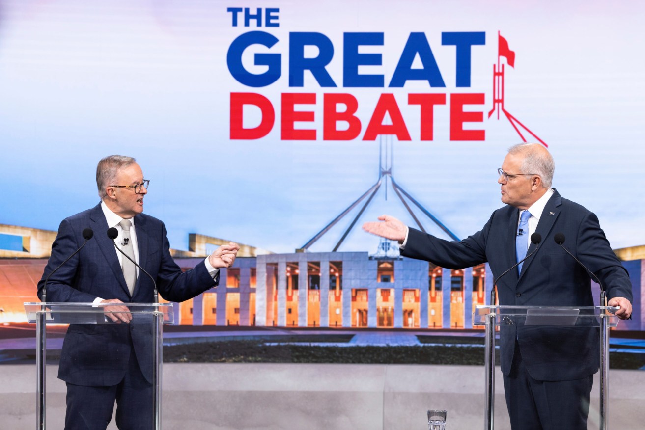 Australian Prime Minister Scott Morrison (right) and Opposition Leader Anthony Albanese during the second leaders' debate ahead of the federal election at Nine Studios in Sydney. AAP Image/Pool, Alex Ellinghausen) 