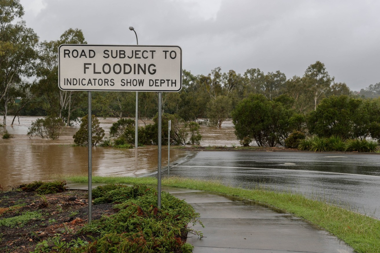 A Ballandean man remains missing after last week's floods and heavy rain in Queensland. (AAP Image/Russell Freeman) 