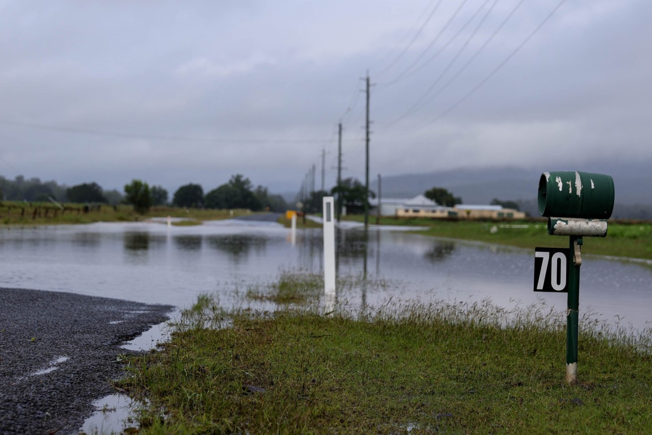 Floodwaters cut off roads in and around Laidley in the Lockyer Valley.  (AAP Image/Russell Freeman) 