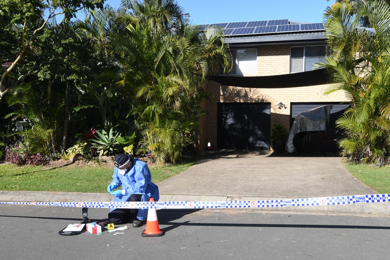 Police are seen outside the home of Australian boxer Justis Huni in Brisbane, Thursday, June 9, 2022. Queensland police are investigating a drive-by shooting at the home of the Australian boxing champion . (AAP Image/Darren England) 