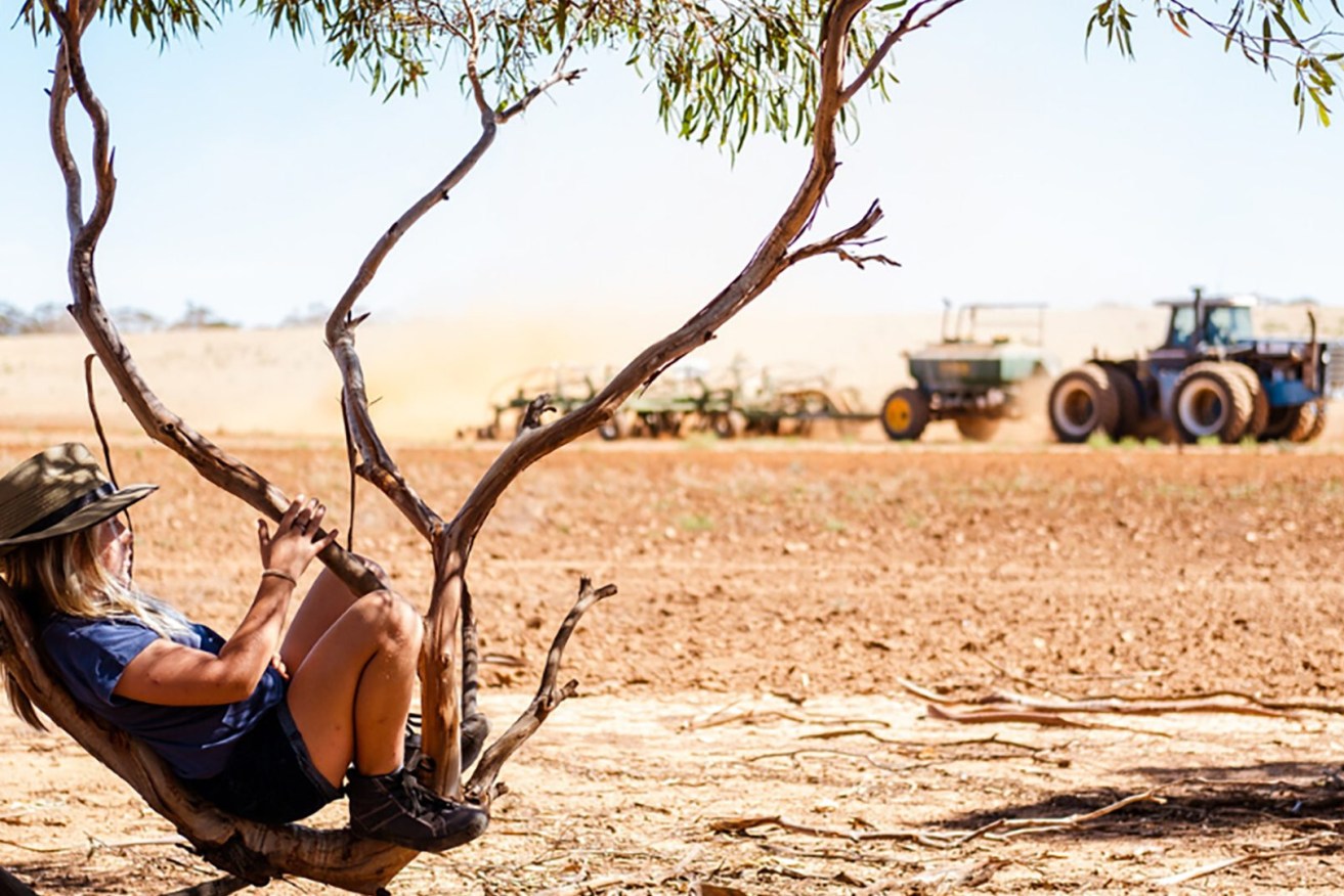 Poppy Thannhauser waits for her dad to finish work at a farm near Mildura, Victoria. The image was taken by her mother Aimee, as is one of 12 winners of Rural Aid's Spirit of the Bush photography awards.. (AAP Image/Supplied by Rural Aid, Aimee Thannhauser) 