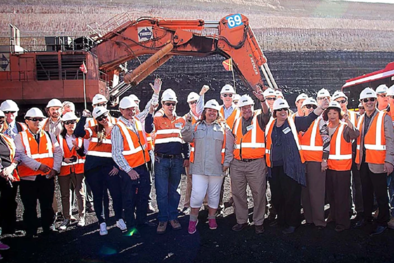 Gina Rinehart and workers at the Alpha project. (Photo ABC)