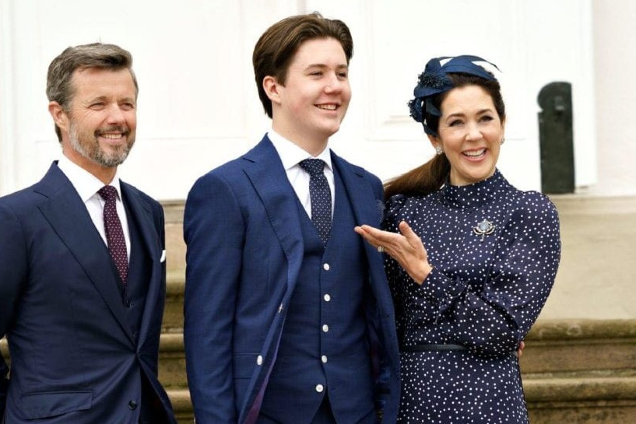 Danish Prince Christian stands with Crown Prince Frederik and Crown Princess Mary after his confirmation ceremony at Fredensborg Castle Church, Denmark (AAP photo)