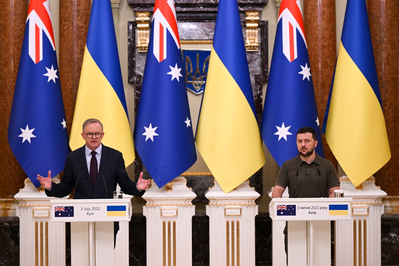 Australian Prime Minister Anthony Albanese (left) and Ukrainian President Volodymyr Zelenskiy speak to the media during a press conference at the Presidential Palace in Kyiv, Ukraine, . (AAP Image/Lukas Coch) 