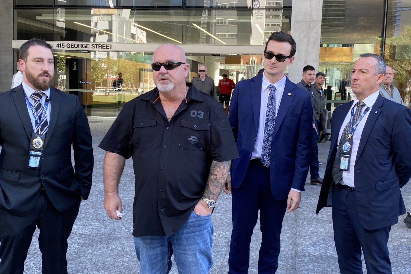 Brett Beasley (2nd-left), father of Gold Coast teenager Jack Beasley, who died after a fight broke out between two groups in Surfers Paradise in December 2019 (AAP Image/Cheryl Goodenough) 