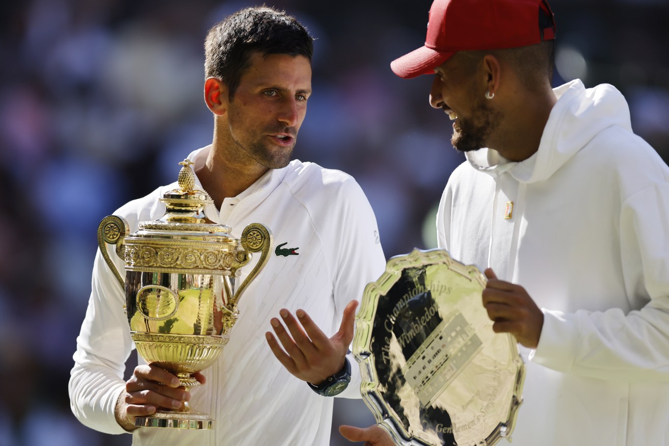 epa10064062 Winner Novak Djokovic (L) of Serbia and runner-up Nick Kyrgios of Australia during the award ceremony after their men's final match at the Wimbledon Championships, in Wimbledon, Britain, 10 July 2022.  EPA/TOLGA AKMEN   EDITORIAL USE ONLY