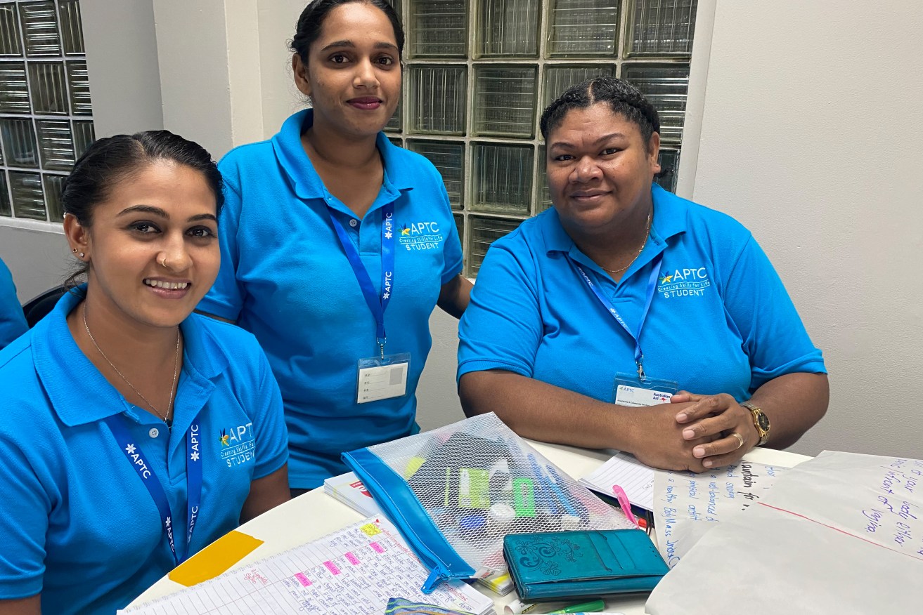Shinal Prasad, Rachael Kumar and Karalaini Seru pose for a photograph in Suva, Fiji, Monday, July 18, 2022. Shinal Prasad, Rachael Kumar and Karalaini Seru are heading to Australia to work in aged care following a training course in Suva. (AAP Image/Paul Osborne) NO ARCHIVING