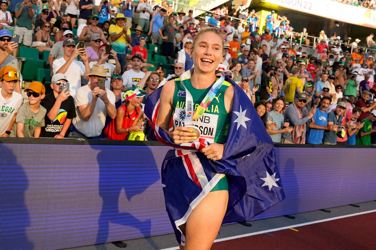 Australia's Eleanor Patterson celebrates after winning the gold medal in the women's high jump final at the World Athletics Championships. (AP Photo/Charlie Riedel)