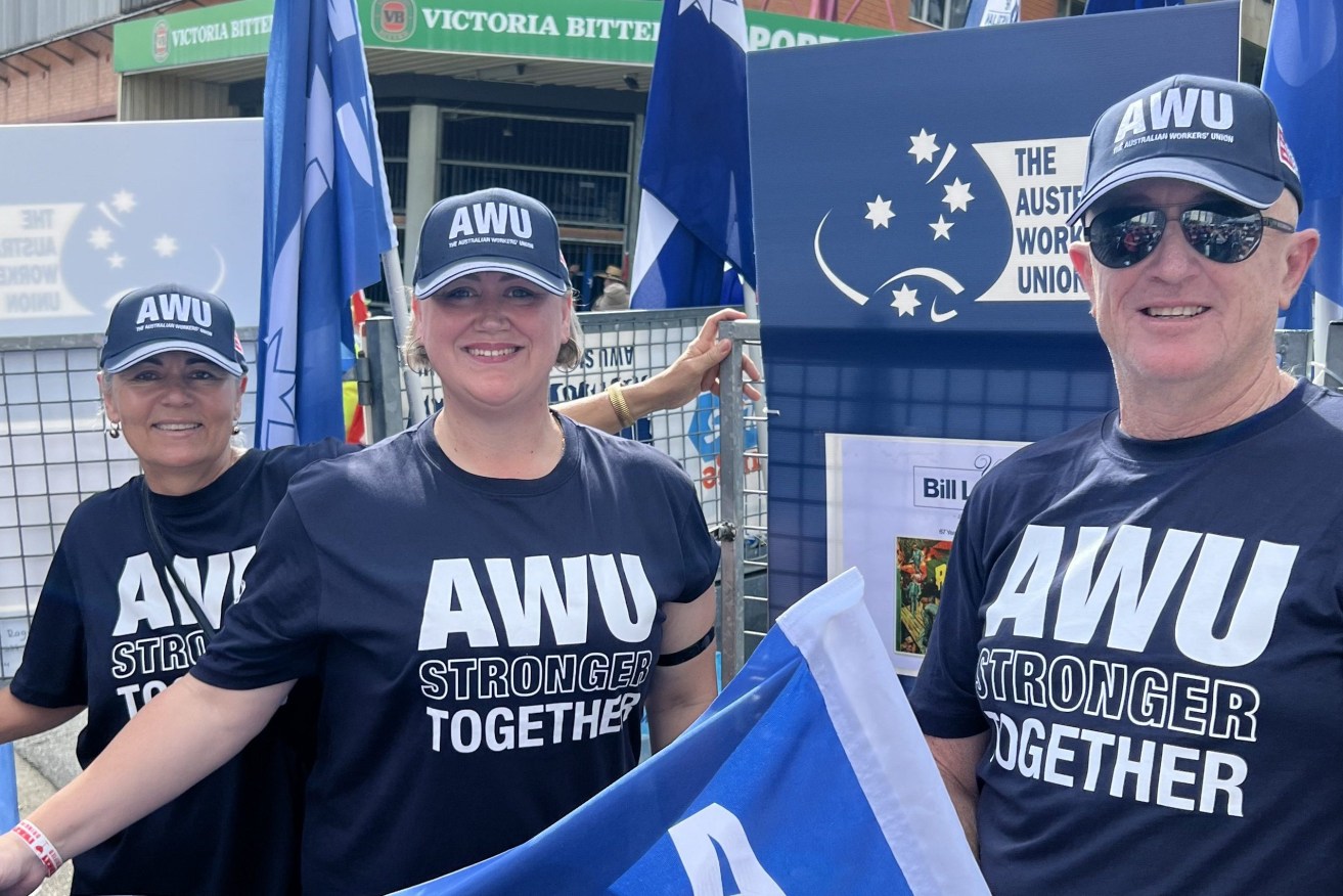 Stacey Schinnerl (centre) with AWU president Marina Chambers (left) and outgoing state secretary Steve Baker at this year's Labour Day march. (Image supplied)
